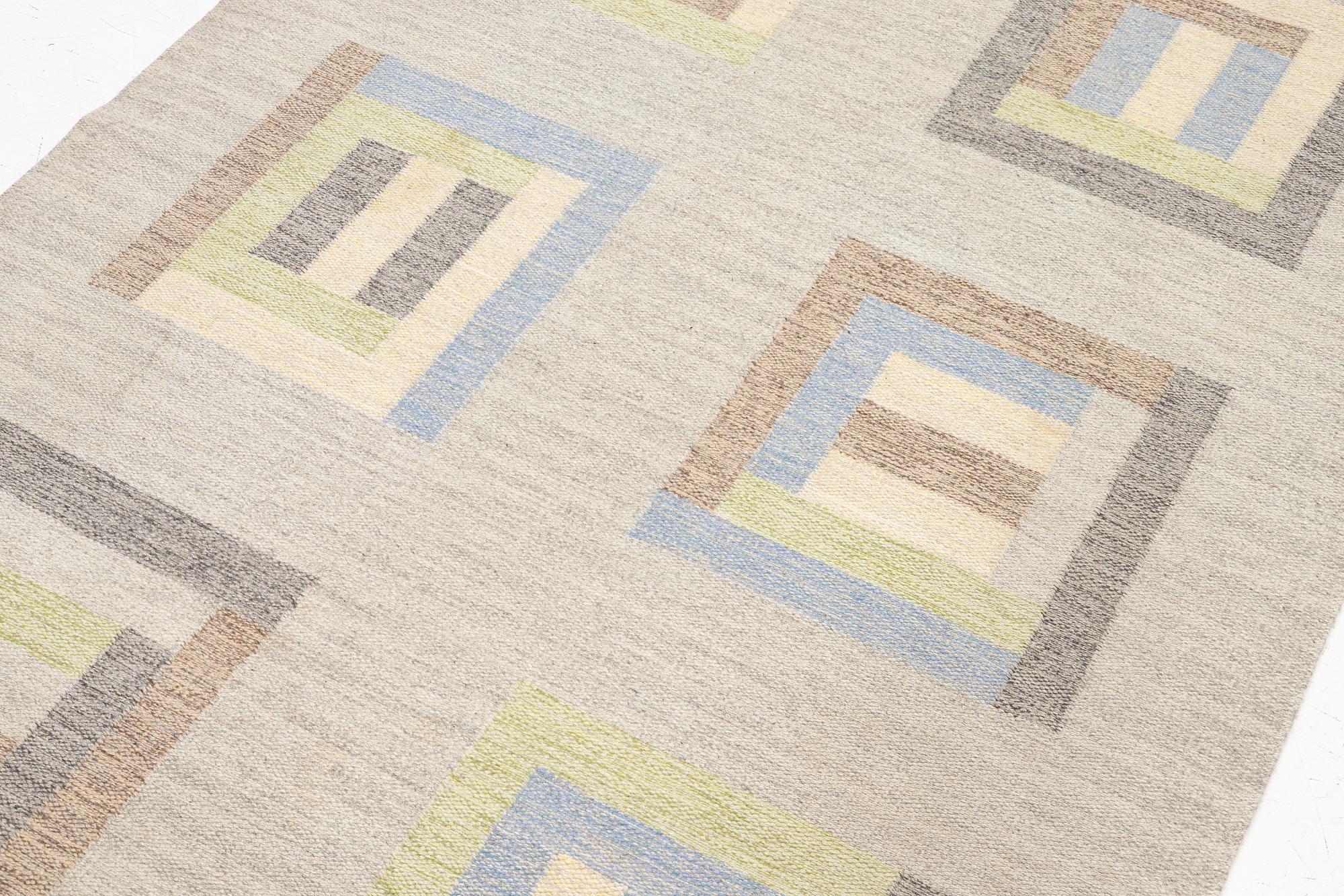 Margareta Åkerberg “Rödlöga” flatweave rug, 250 x 173 cm, signed MÅ.
