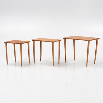 A teak and oak nesting table, 1950s.