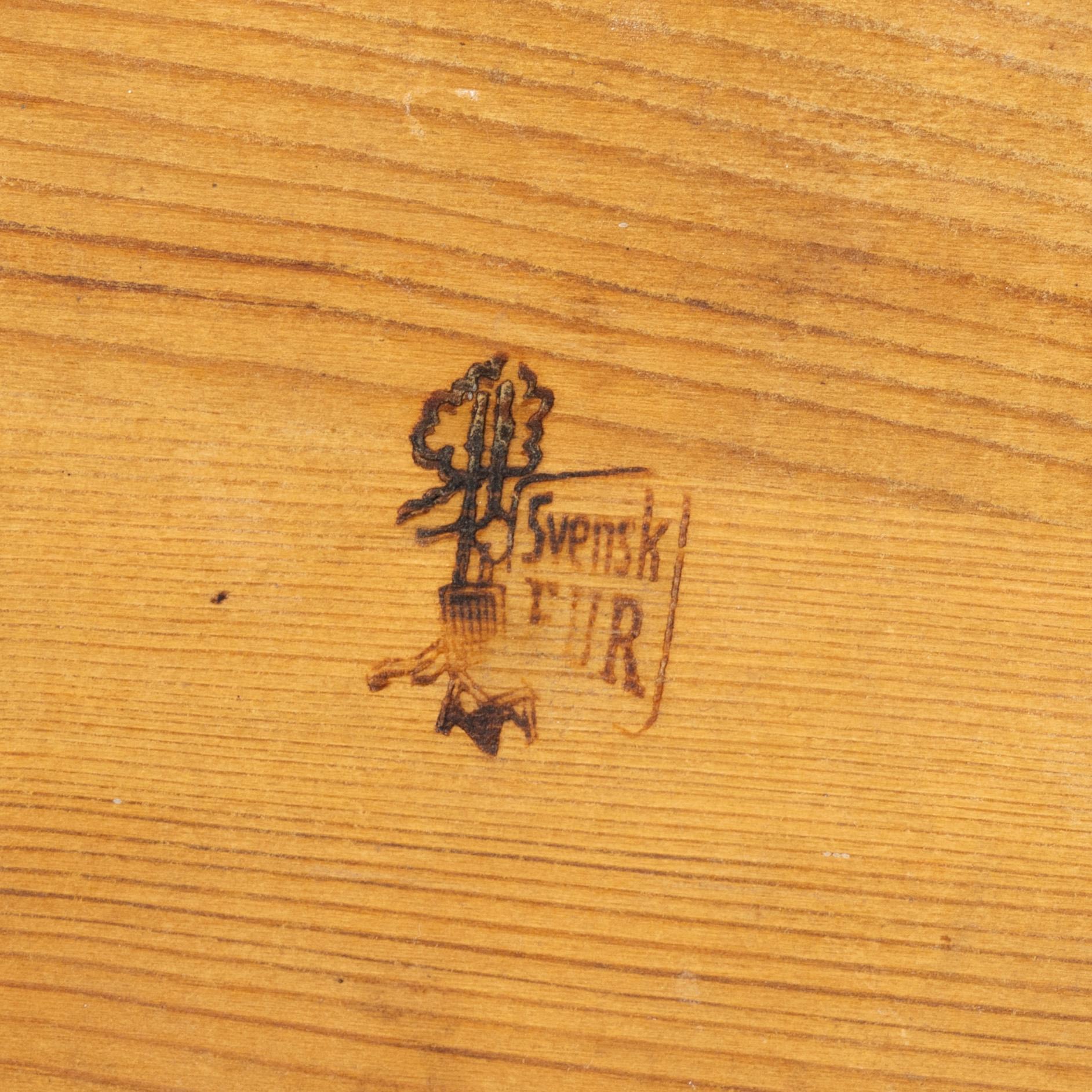 Carl Malmsten, a pair of "Visingsö" stools, Svensk Fur, second half of the 20th century.