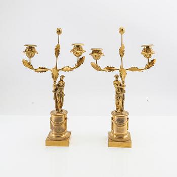 A pair of Empire candelabras from the first half of the 19th century.