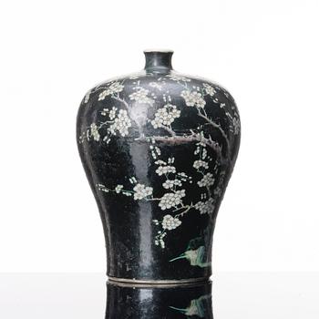 A Chinese famille noire Meiping vase, Qing dynasty, 19th Century.