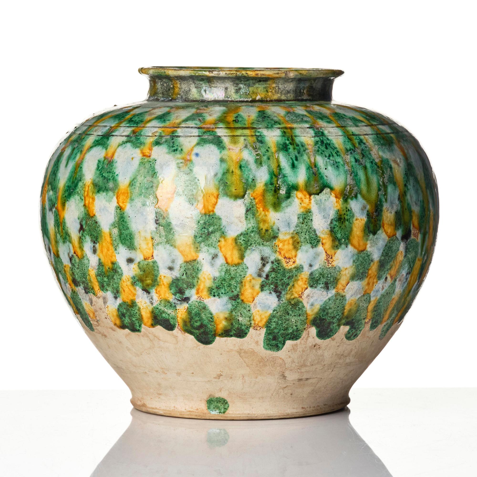 A sancai-glazed pottery jar, Tang dynasty (618-907).