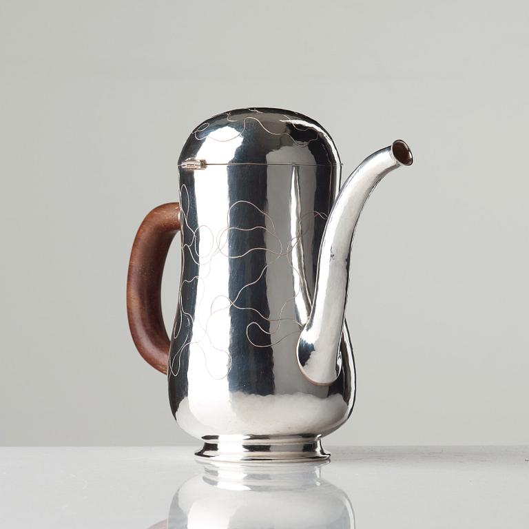 Olle Ohlsson, An Olle Ohlsson sterling coffee pot, executed in his Stockholm workshop in 2003.