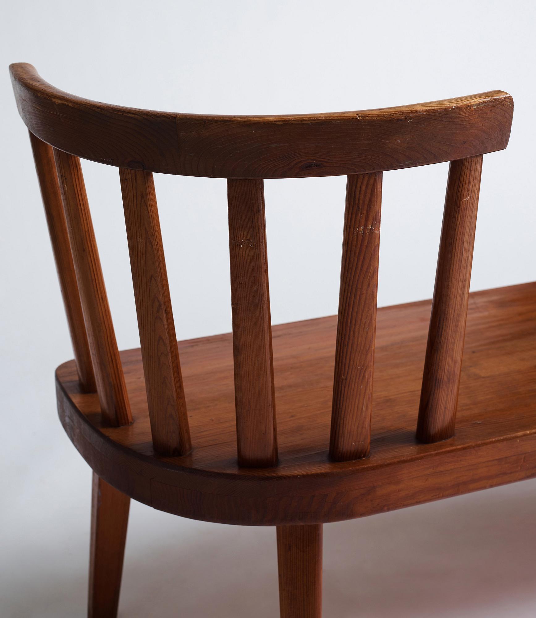 Axel Einar Hjorth, a stained pine 'Utö' sofa, Nordiska Kompaniet 1930s.