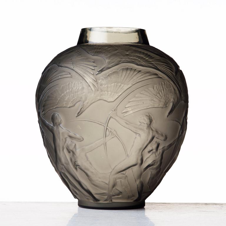 René Lalique, an "Archers" moulded smoke-coloured glass vase, model nr 893, France, post 1921.