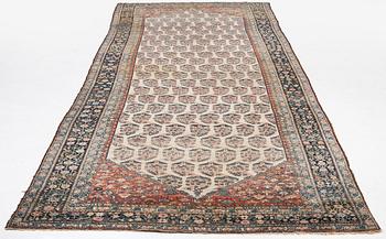 A Bakhtiari carpet, signed, c. 580 x 212 cm.