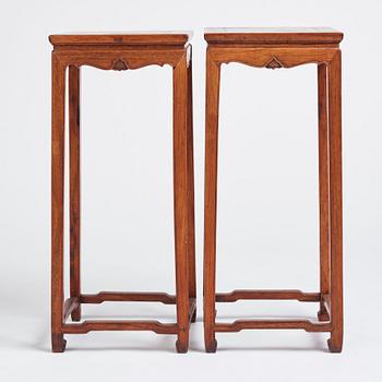 A pair of huanghuali jardiniere stands, Qing dynasty.