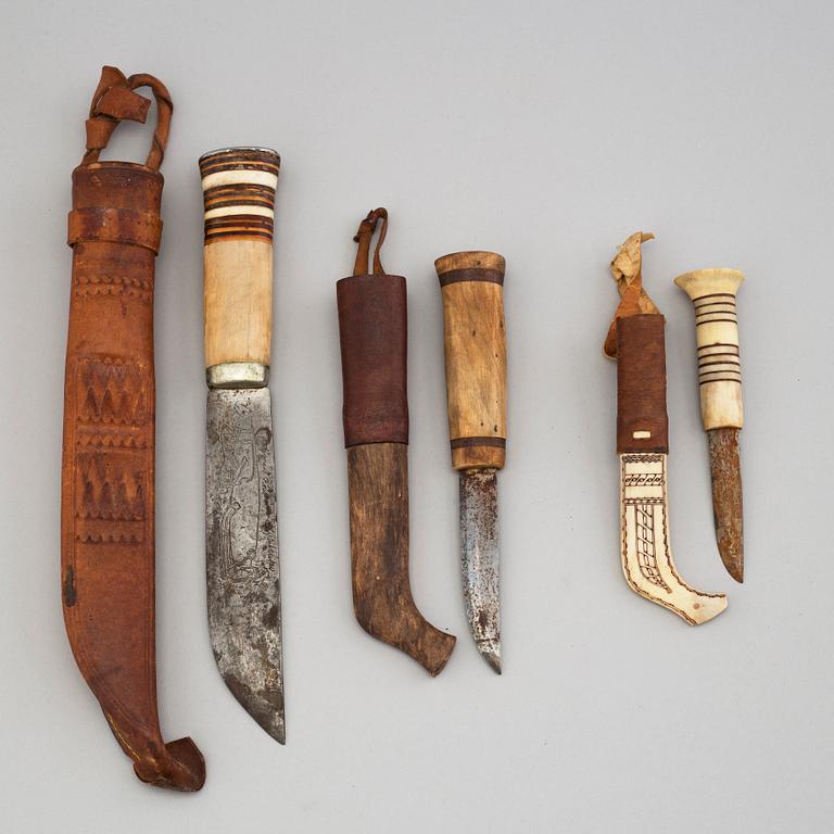 Seven Sami knives.