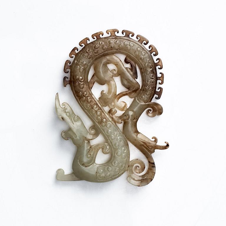 A Chinese carved nephrite sculpture of a dragon and a qilindragon.