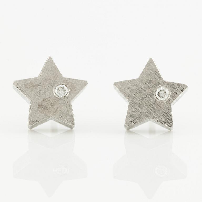 Ole Lynggaard a pair of star-shaped earrings.