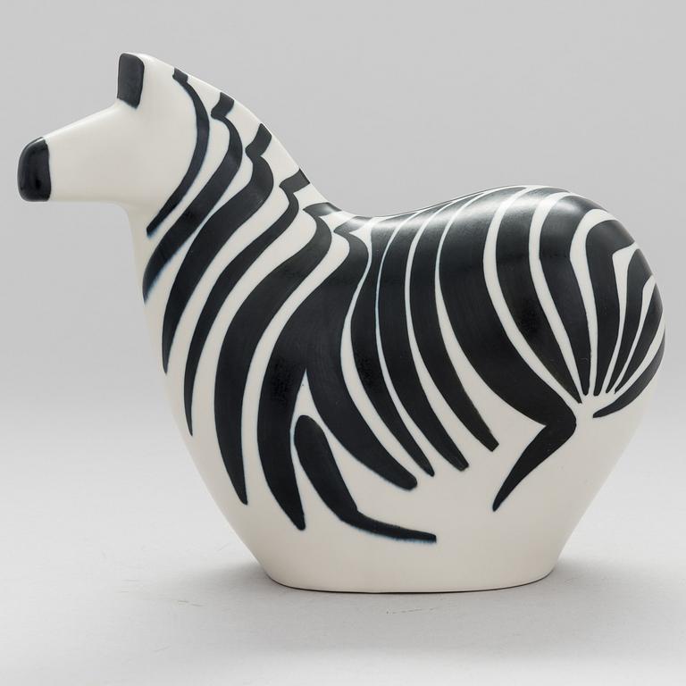 A STONEWARE FIGURINE by LILLEMOR MANNERHEIM, signed Lillemor Arabia -85.