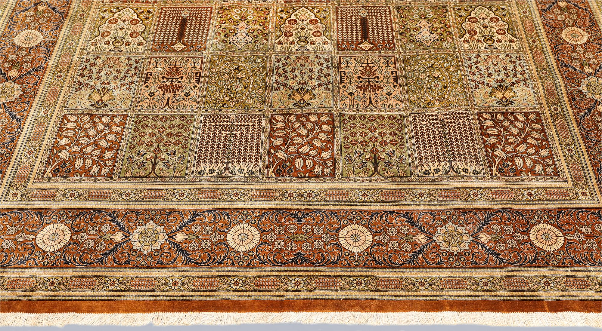 A Gohm silk rug, signed, approx. 307 x 195 cm.