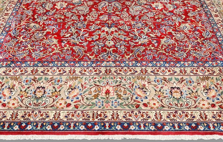 A carpet Yazd, c. 394 x 299 cm.