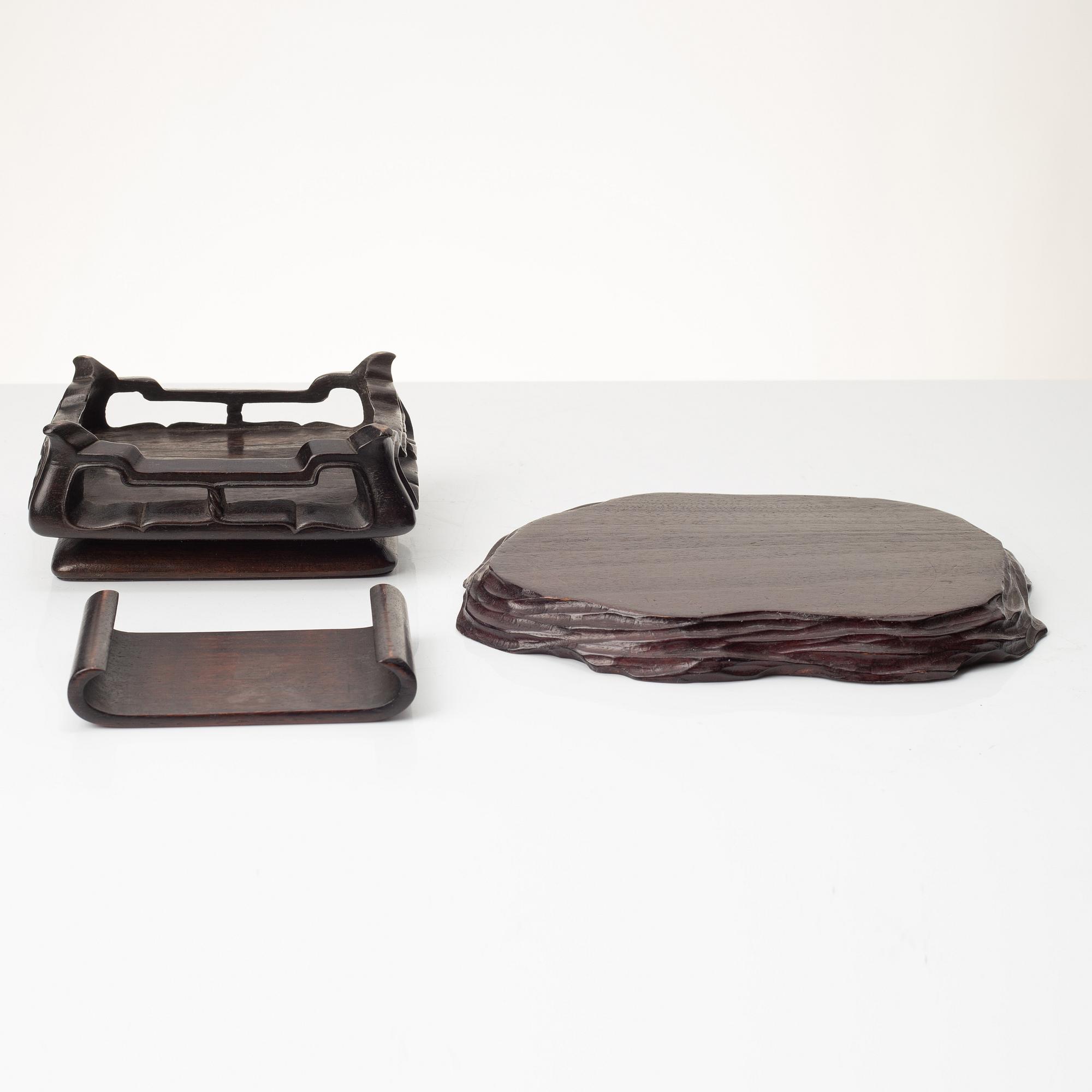A group of Chinese hardwood stands and a cover, Qing dynasty and later.