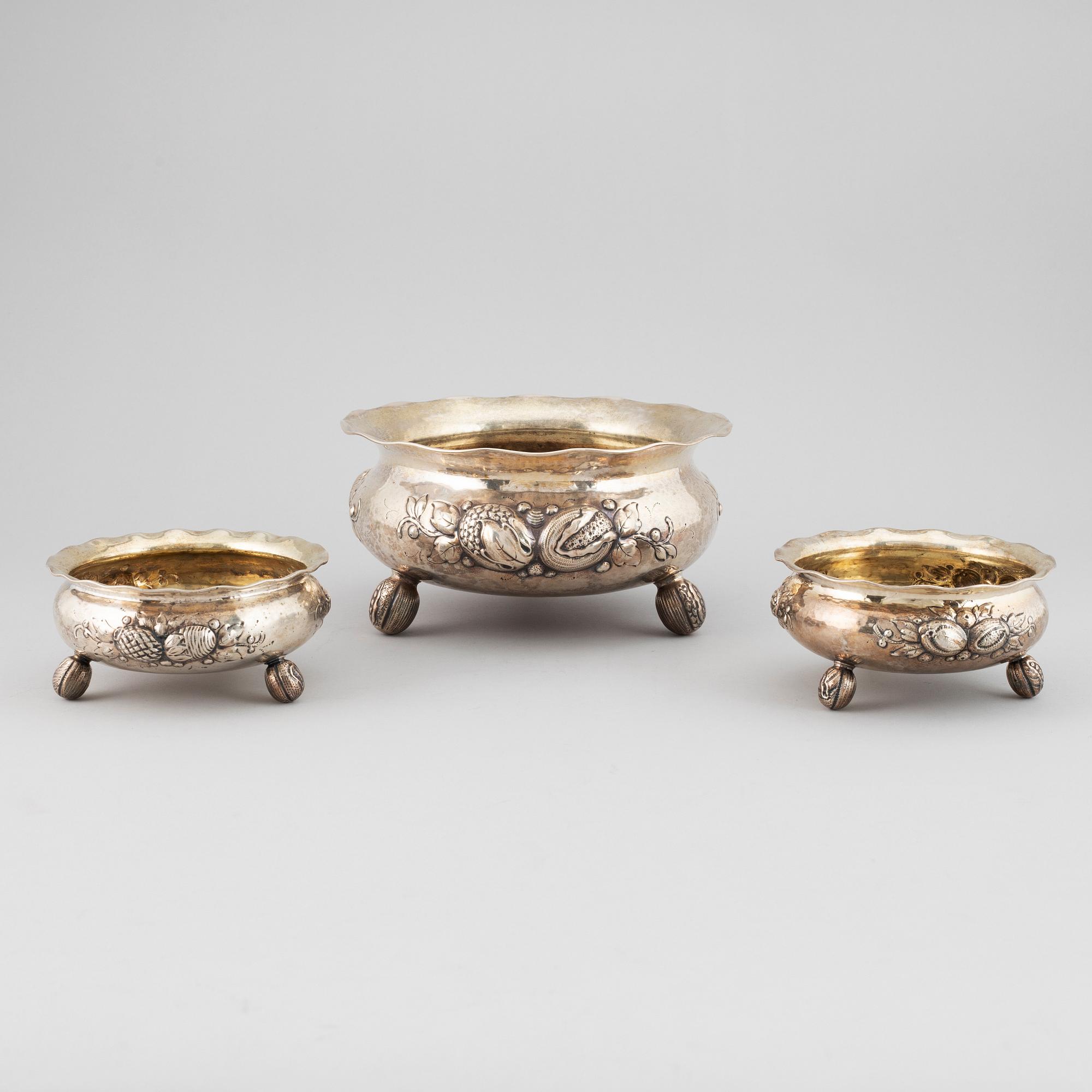 A set of three BAroque style silver bowls, maker's mark CG Hallberg, Stockholm, 1949-1950.