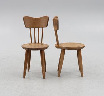 A set of sports cabin model chairs, around the mid-20th century.