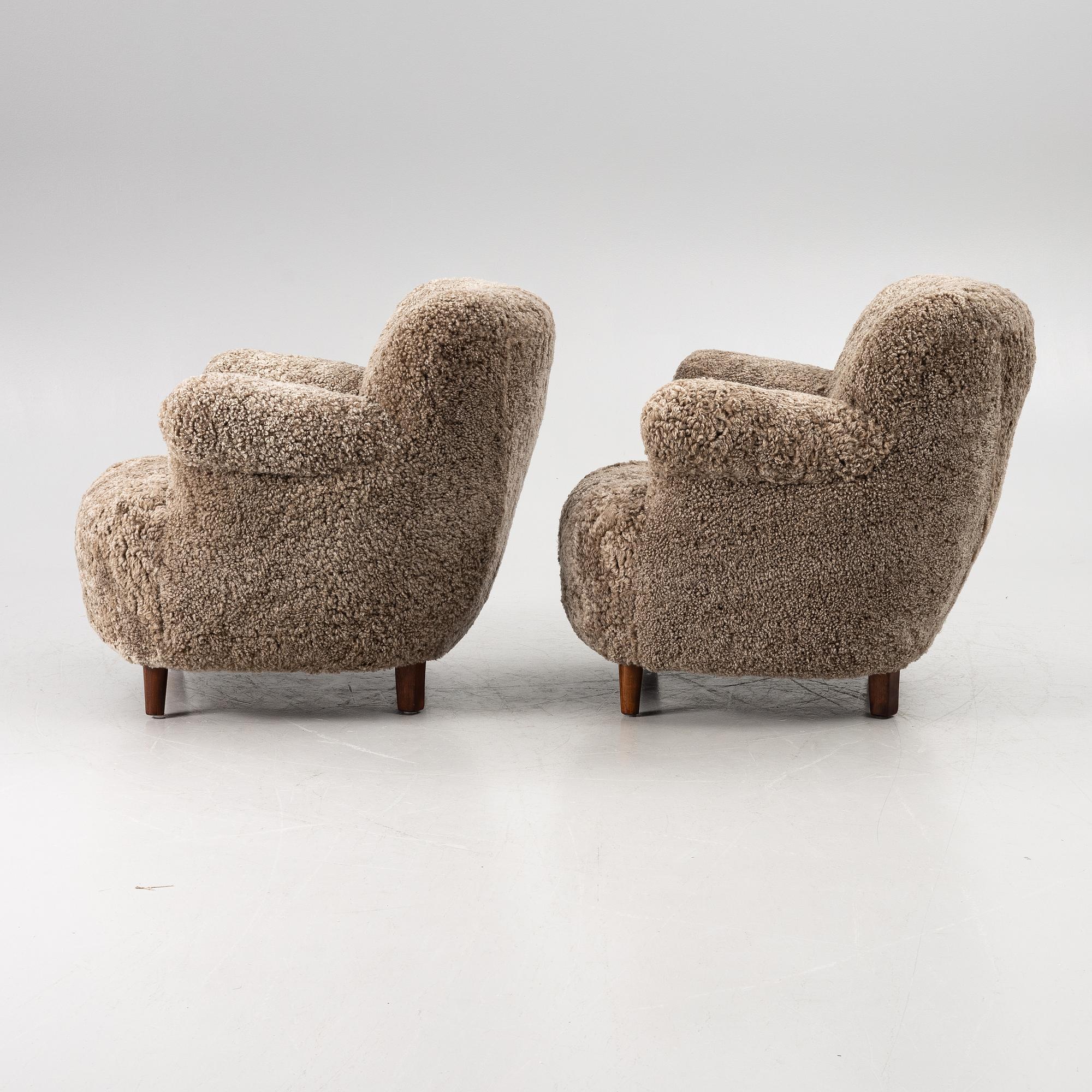 A pair of easy chairs, mid-20th century.