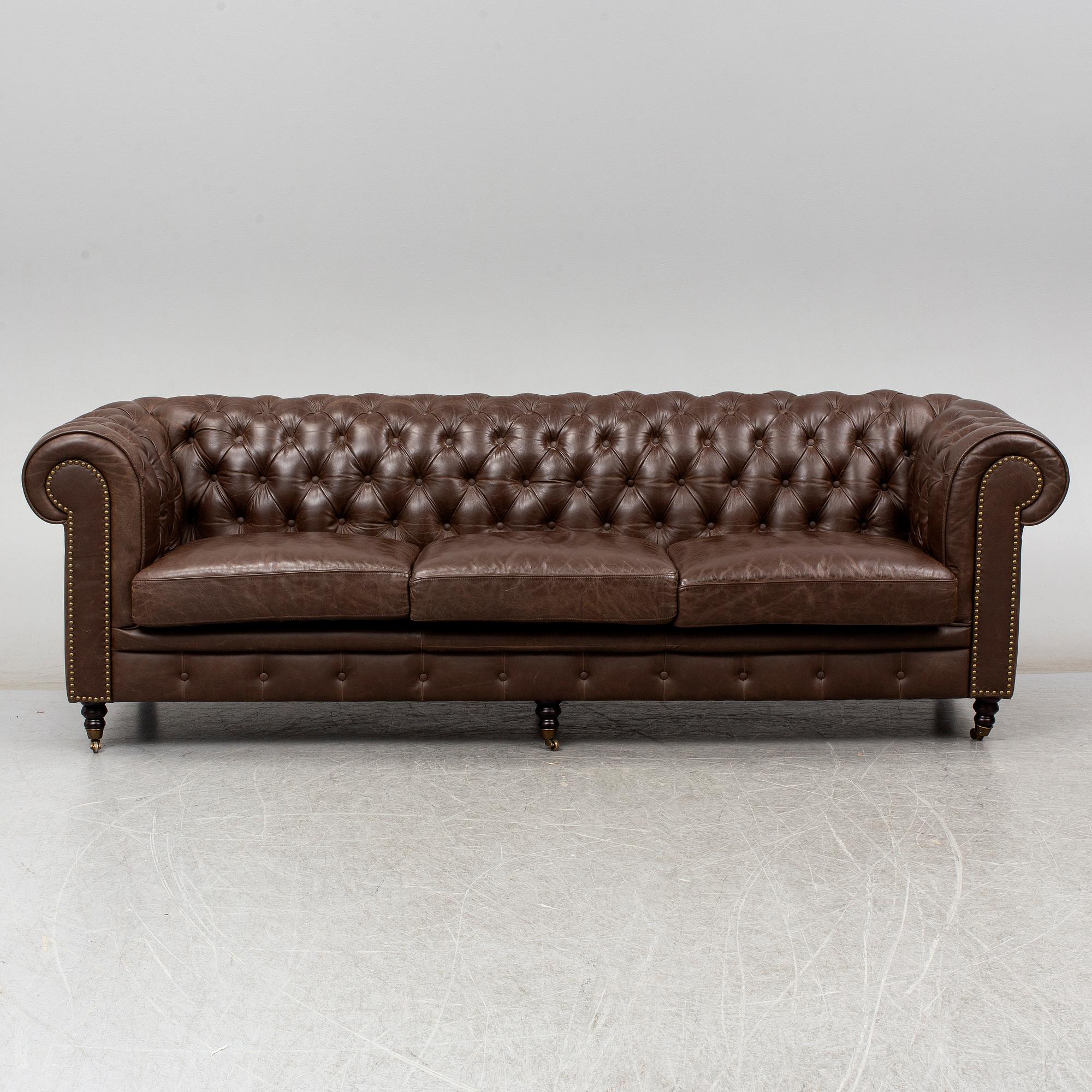A modern chesterfield sofa.
