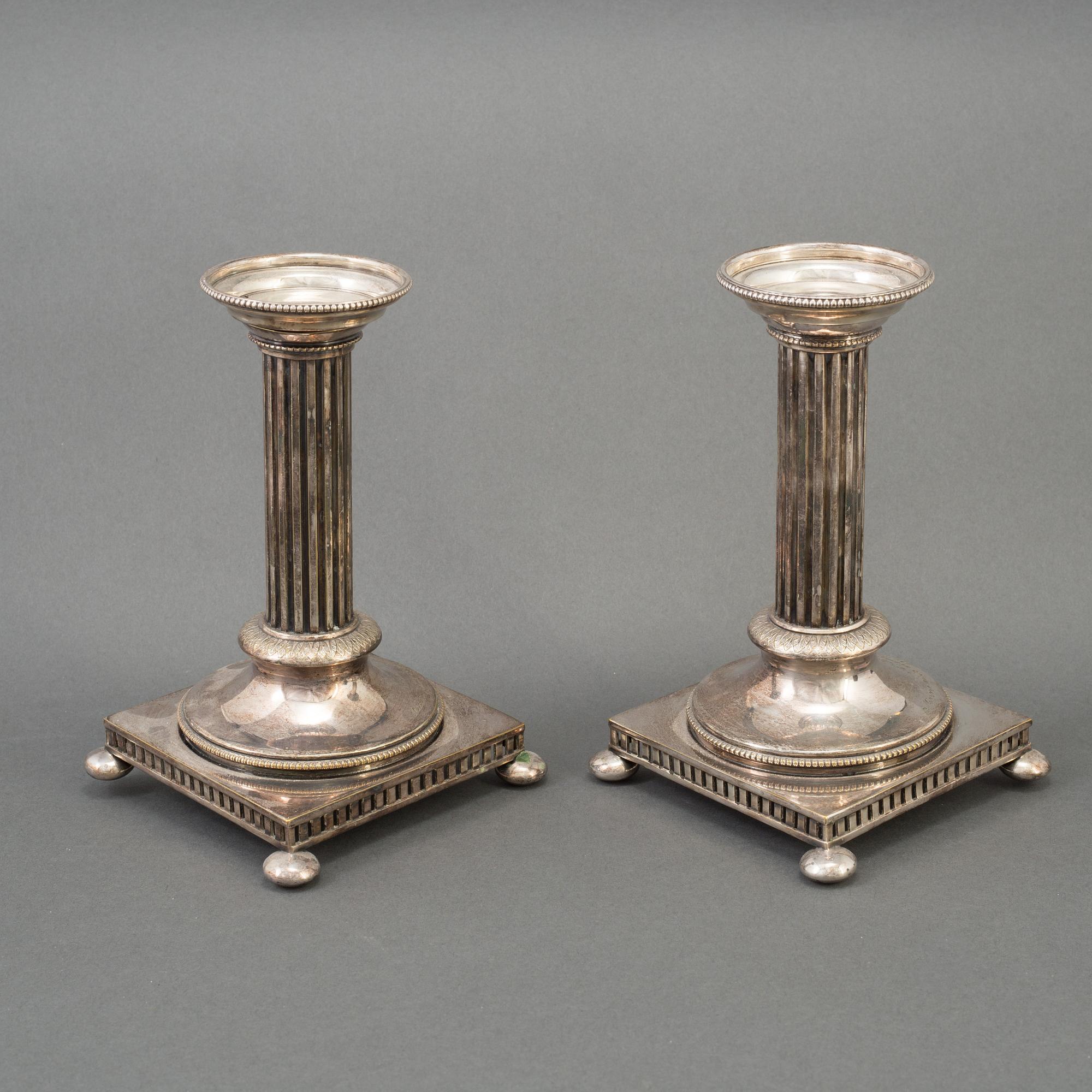 GULDSMEDSAKTIEBOLAGET (GAB), Ljusstakar, nysilver, Gustaviansk stil, 1900-talets första hälft.