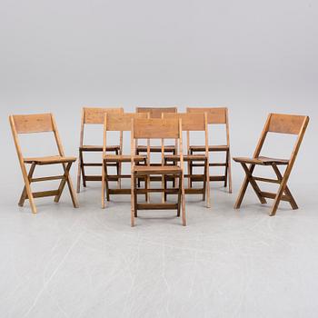 a set of 8 foldable chairs from the 1930's.