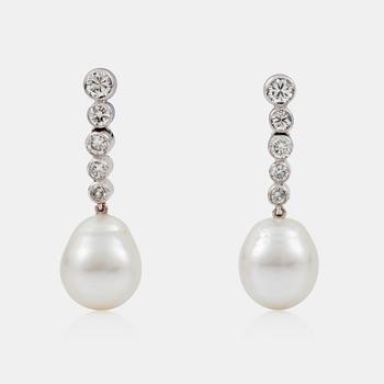 1281. A pair of semi-baroque cultured pearl and brilliant-cut diamond earrings. Total carat weight of diamonds circa 0.70 ct.