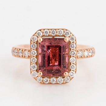 Emerald-cut pink tourmaline and brilliant-cut diamond ring.