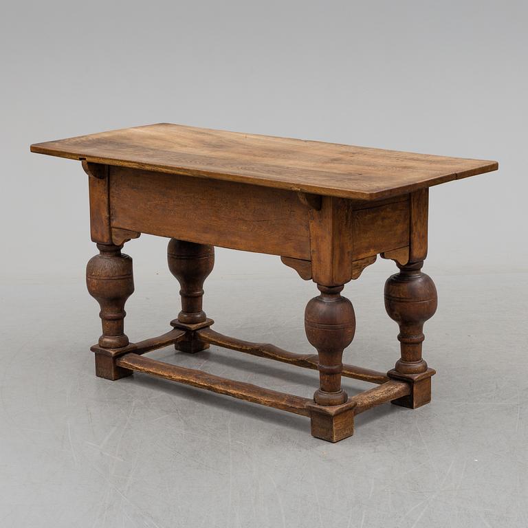 An oak and pine baroque table, 17th/18th Century.