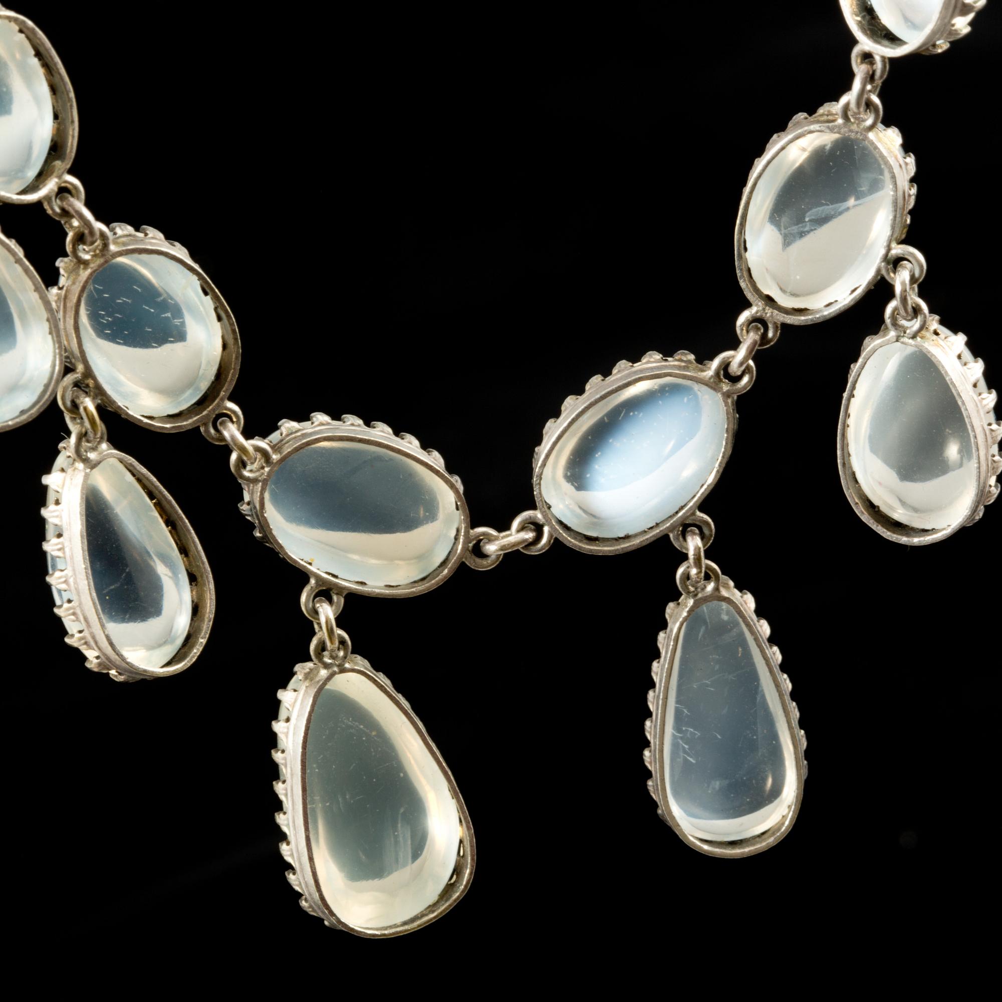 A cabochon-cut moonstone necklace. Made by C G Hallberg, Stockholm 1907.