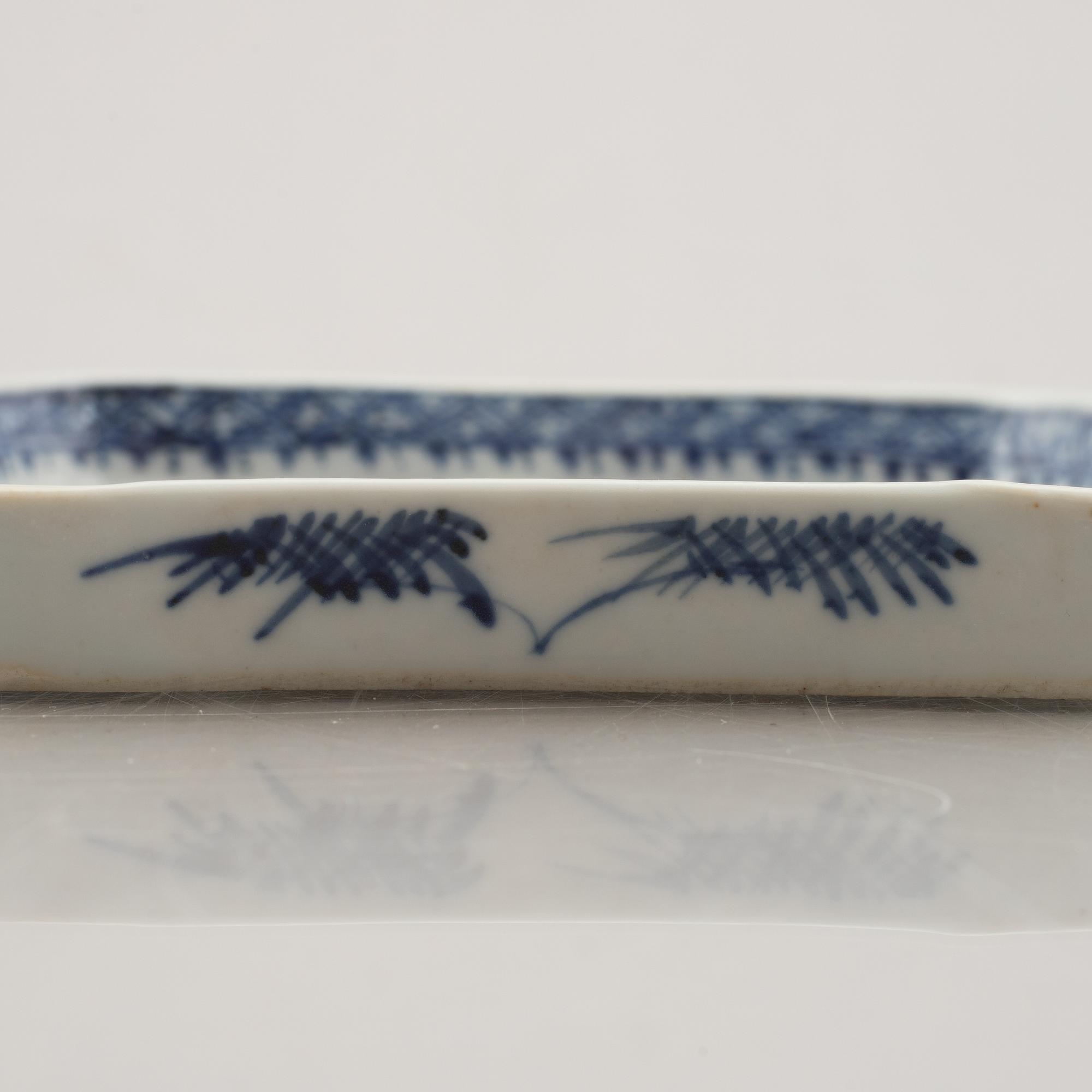 A nine piece Chinese porcelain cabaret in its original lacquer box, Qing dynasty, Qianlong (1736-95).