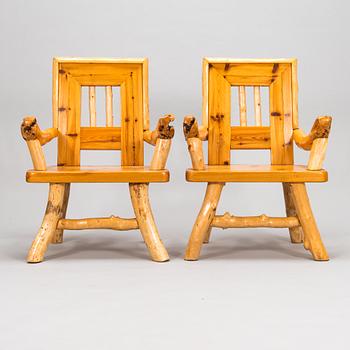A pair of mid-20th-century armchairs made by Tauno Saarela Kuusamo Finland.