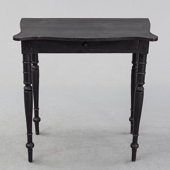 A painted pine table, second half of the 20th Century.