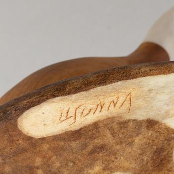 Lars Levi Sunna, a reindeer horn and birch figurine of a grouse, signed.