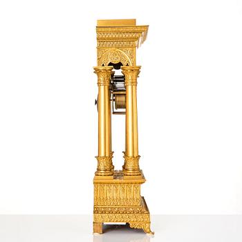 An Empire ormolu portico mantel clock for the Turkish market, first part of the 19th century.