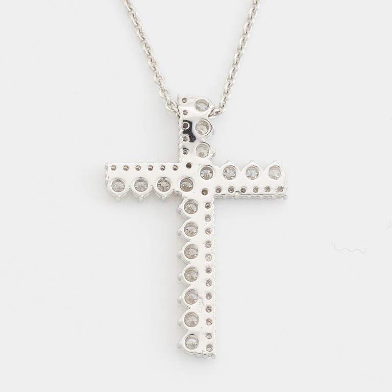 Brilliant cut diamond cross necklace.