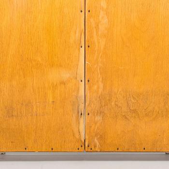 A 1950s three-part dressing mirror.