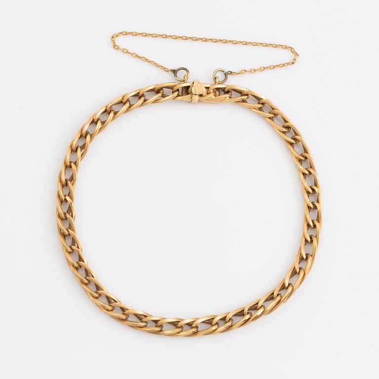 Armlänk guld.