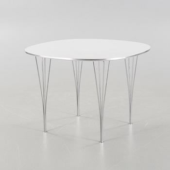 A table by Bruno Mathsson & Piet Hein for Fritz Hansen, model "Supercirkel", dated 1975.