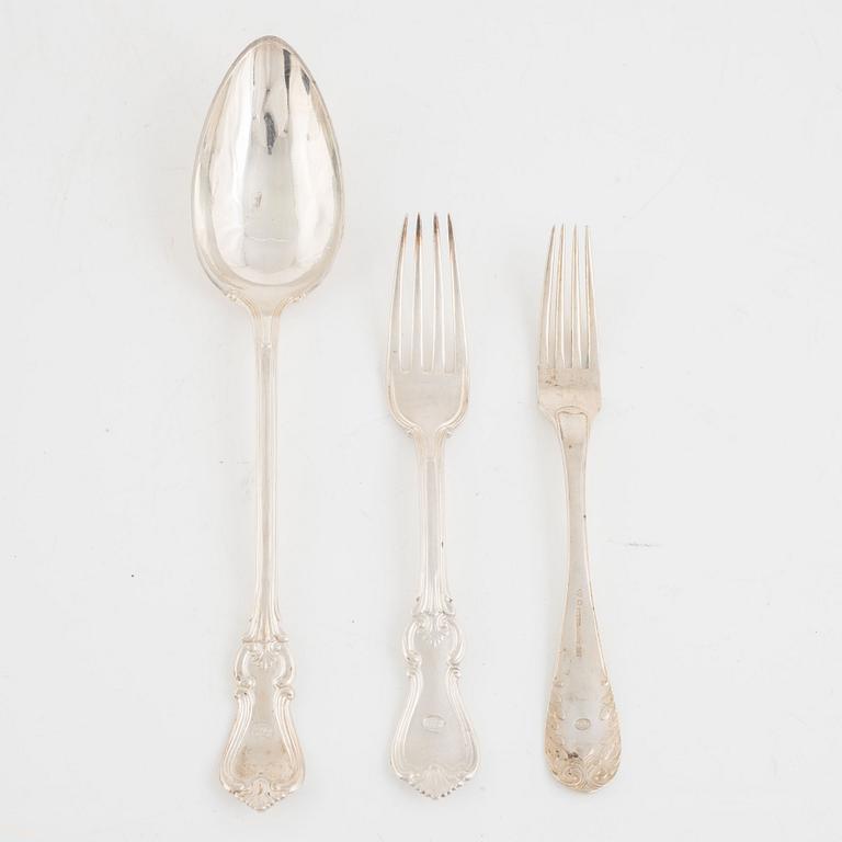A group of eleven Swedish silver forks and a spoon, 19th Century.