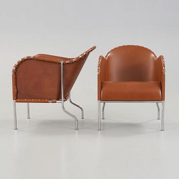 Mats Theselius, A pair of 'Bruno' brown leather and steel easy chairs, Källemo, Sweden.