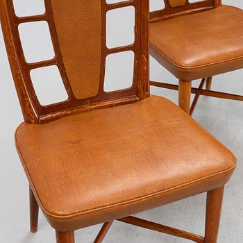 Three beech and mahogany chairs, mid 20th Century.