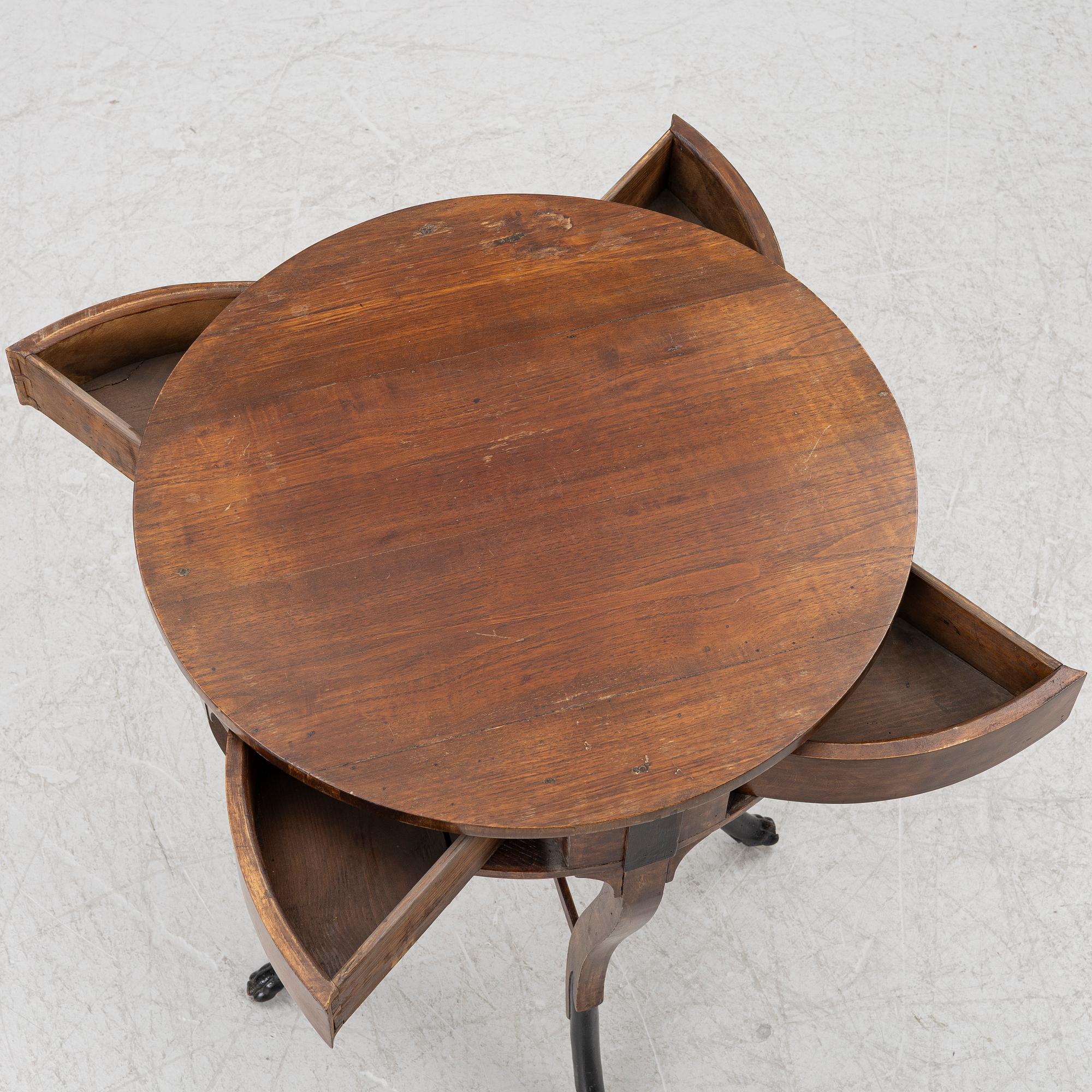 An Empire table, northern Europe, early 19th century.