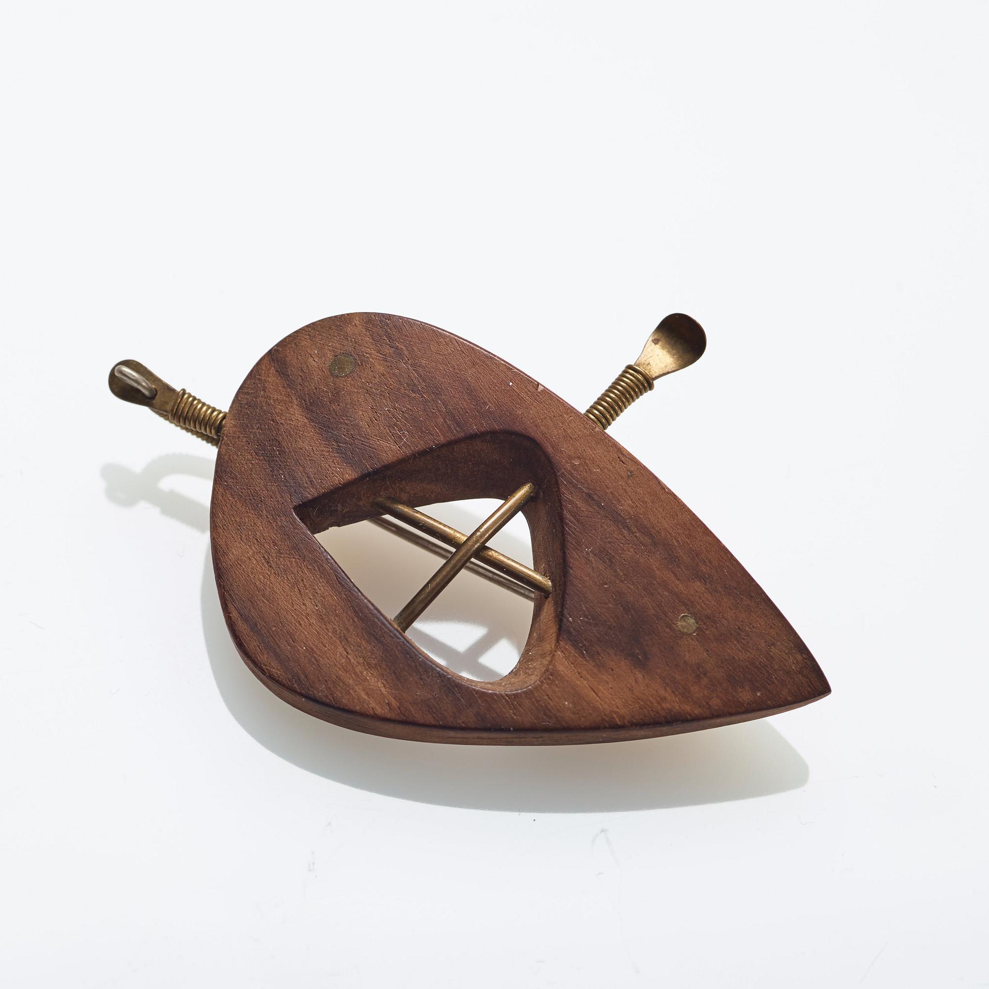 Vivianna Torun Bülow-Hübe, a wooden and brass brooch, executed in her own workshop, Stockholm ca 1948-52.