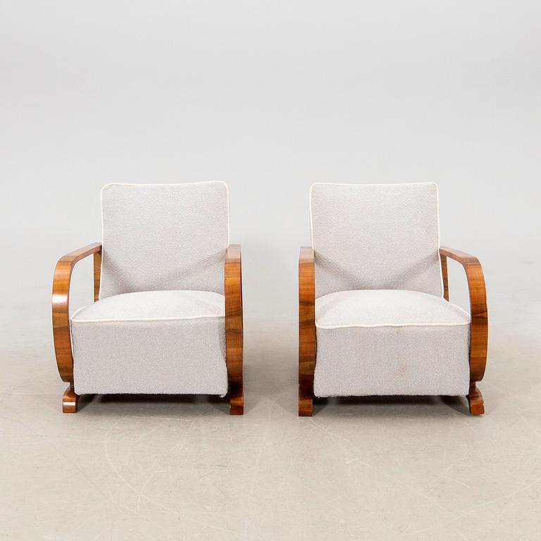 A pair of Art Deco armchairs.