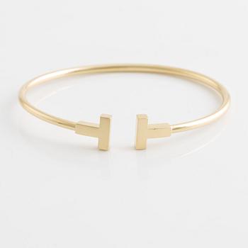 Tiffany & Co armband "T" 18K guld.