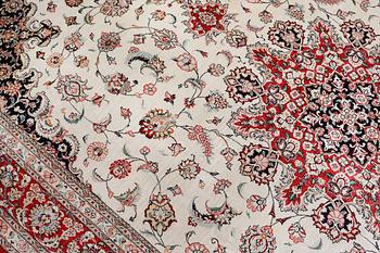 A silk Ghom carpet, 295 x 195 cm.