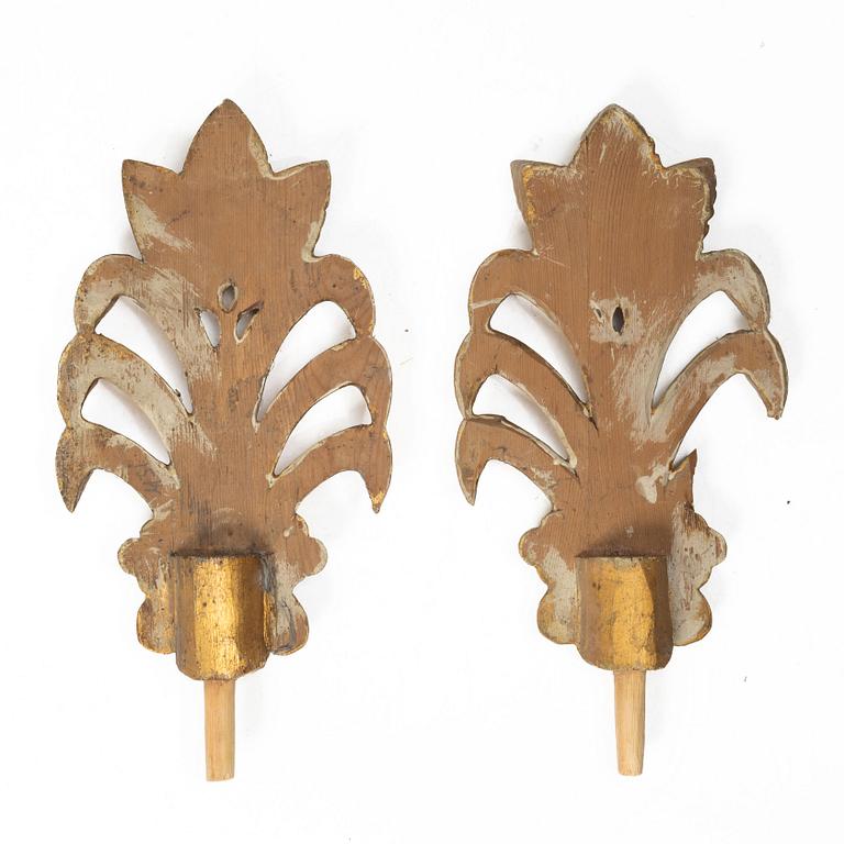 Two pairs of curtain-rod finials, early 19th Century.
