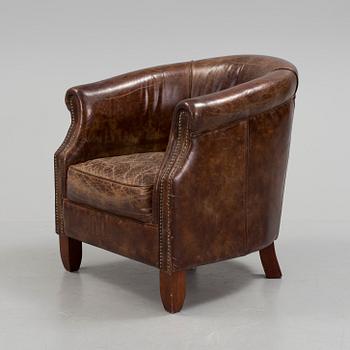 A leather club lounge chair by Newport, ca 2000.