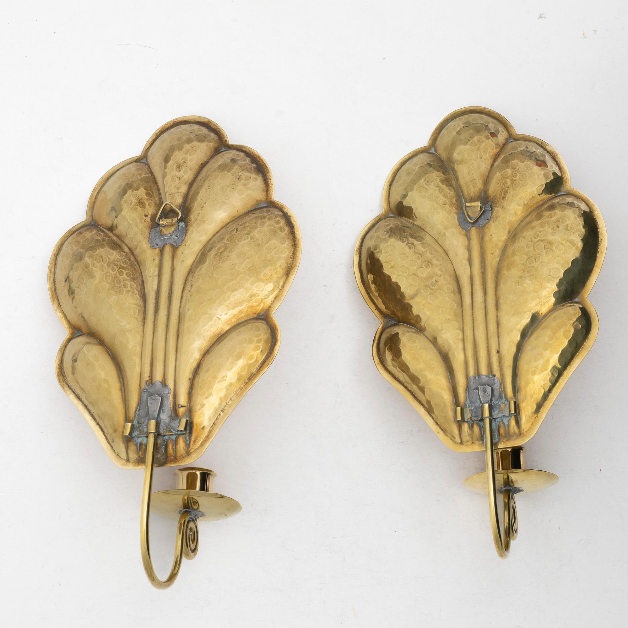 Lars Holmström, a pair of brass sconces, Swedn, first half of the/mid20th century.