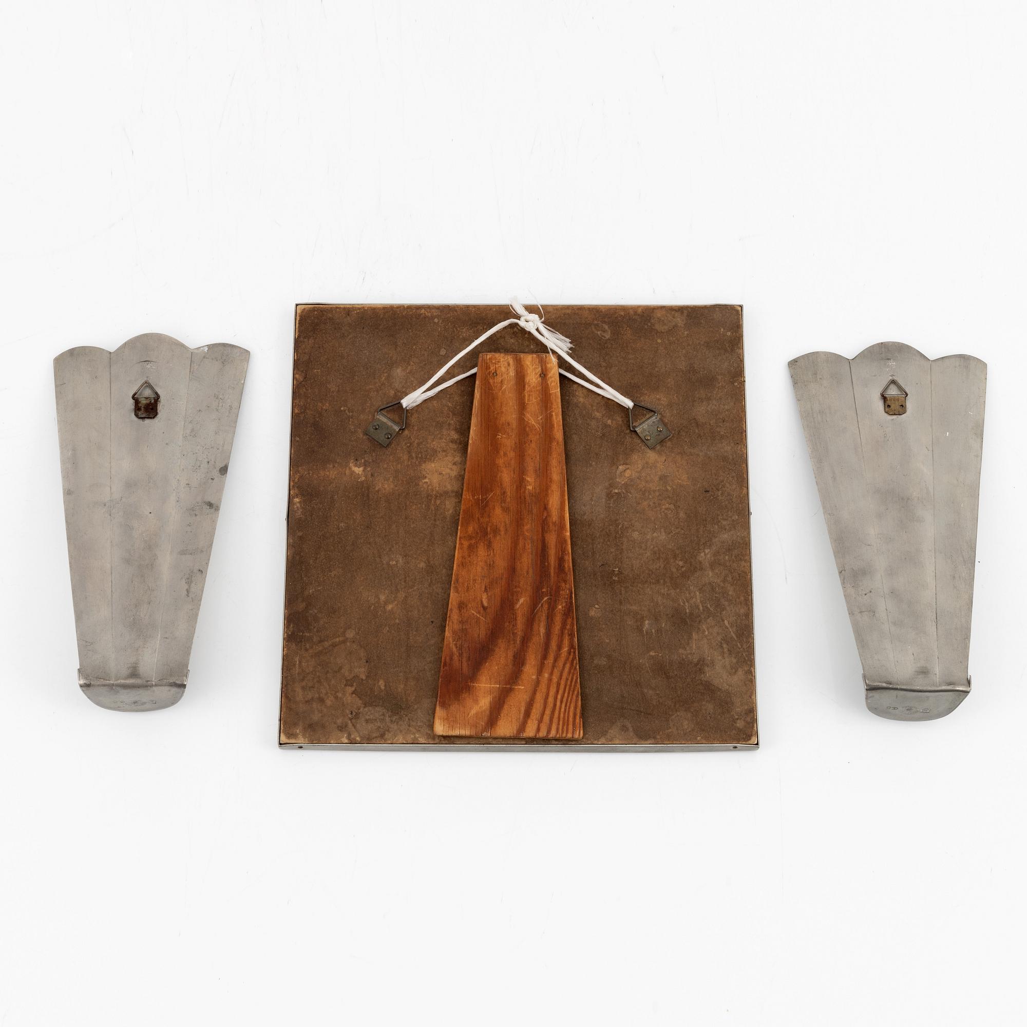 Nils Fougstedt, A pair of pewter sconces and a mirror, Firma Svenskt Tenn, 1940 and -29.