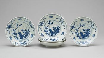 76. A set of five blue and white 19th Century Japanese bowls.